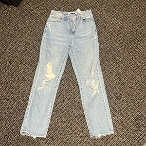 Light wash celebrity pink high rise ripped jeans
